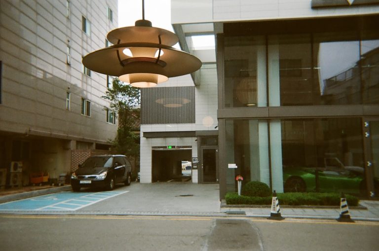 Enhance Your Space with Wood Color Glass LED Pendant Light