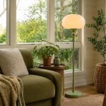 Stylish Sunroom: Milk Glass Floor Lamp and Cozy Sofa